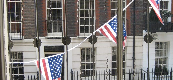 US flags flying across the windows at Benjamin Franklin House