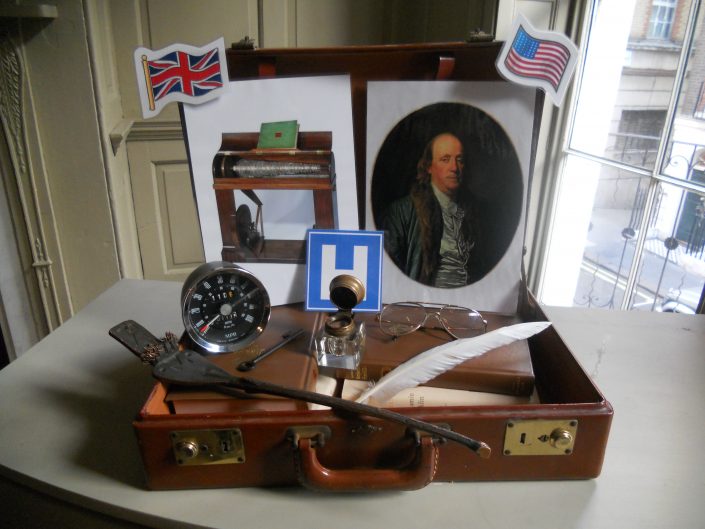Travel suitcase with artefacts relating to Benjamin Franklin