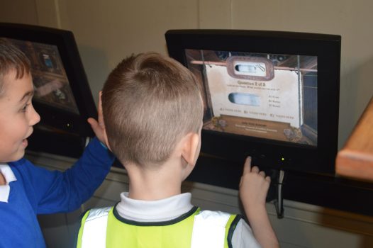 Children playing on the tablets in the Student Science Centre