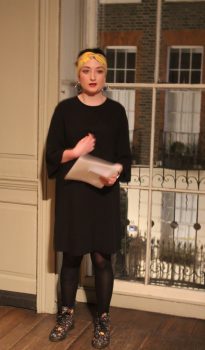 A woman giving a talk in Franklin's parlour