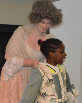 Child dressing up in historical costume