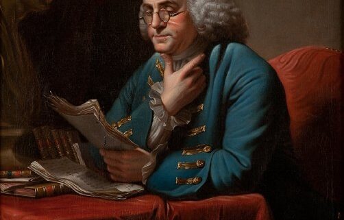 Portrait of Benjamin Franklin by David Martin, reading a paper, wearing a powdered wig